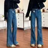 Trompete de comércio transfronteiriço micro-buzina calça jeans feminina de ganga com fenda elástica estilo novo ligeiramente cheia versátil slim fit plus size 2026