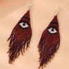 Cinco características, ojos, aretes, explosiones amazónicas, aretes de borla larga caliente transfronterizos europeos y americanos, aretes bohemios