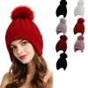 Gorro de punto grueso para adultos de venta caliente transfronterizo, color liso con pompón, cálido y a prueba de viento, gorro de punto para cubrir las orejas al aire libre