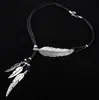 Joyería europea y americana al por mayor plumas hojas Diamante cuerda de cuero negro collar de borlas multicapa cadena para clavícula de mujer cadena para suéter