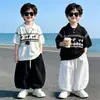 Conjunto de Verano Coreano para Niños de Manga Corta 2026 Nuevo Conjunto Casual de Dos Piezas con Camisa Polo Ropa Fresca para el Verano