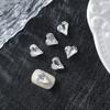 Joyería de diamantes para uñas al por mayor en línea, diseño de celebridades, súper brillante, mariposa torcida, gota de agua cuadrada gruesa, fondo puntiagudo, diamante de forma especial, accesorios para uñas de bricolaje.