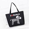 Bolso de Lona Casual para Mujer Transfronterizo Bolso de Hombro con Logotipo Impreso Bolso de Mano para Tutoría Estudiantil Bolso con Patrón de Moda Bolso de Mujer
