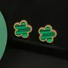 Traje de flor de cinco pétalos de acero inoxidable titanio acero pendientes de cinco pétalos pulsera collar al por mayor trébol de cinco hojas collar de flor de ciruelo juego de tres piezas