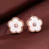 Pendientes de Flor Populares Transfronterizos Temu para Mujer, Diseño de Nicho de Lujo Ligero, Pendientes Elegantes de Gama Alta para el Trabajo, Modernos y Versátiles