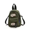 Nueva Mini Bolso Cruzado Estilo Coreano 2025 para Niños y Niñas, Estilo Occidental Insignia de Letra para Bebé Billetera para Monedas Bolso Infantil Transfronterizo