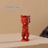 Figurita de Nezha linda de dibujos animados tallada en sándalo morado, artículo de artesanía, coleccionable, adorno de mano, decoración de escritorio, regalo adorable