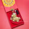 Popular Chaveiro Cavalo Pequeno de Ouro Puro Caixa de Presente Pingente Decoração de Bolsa Presente de Ano Novo Venda por Atacado