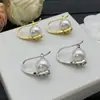 Familia Hua/Huajia Pendientes de Botón de Latón con Tachuelas de Diamante en Forma de V Transfronterizos Pendientes de Perla Versátiles de Plata 925 para Mujer