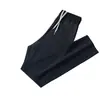 Pantalones finos de verano al por mayor, pantalones casuales de secado rápido, pantalones deportivos rectos de seda helada sueltos de talla grande para hombre
