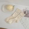 Nuevos calcetines de encaje de color liso para primavera y verano 2025, calcetines de punto para mujer con borde enrollado de capullo de flor, lisos y elegantes, venta al por mayor