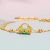 Nueva pulsera vintage con diseño de estanque de loto Yuhuan, nueva pulsera con cierre de koi y gota de aceite de esmalte chino, joyería de oro de estilo chino.