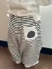 Calça infantil 2026 novo estilo de inverno solta e moderna versátil quente forrada com fleece perna larga listrada para crianças