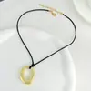 Joyería transfronteriza europea y americana personalidad collar colgante hueco irregular en forma de corazón femenino simple geométrico ovalado collar de cuerda encerada