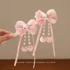 Diadema de Saludos de Año Nuevo para Niños Pasador Rojo con Lazo para Bebé Bola de Pelo con Borla Estilo Chino para Niñas