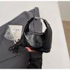 Nova Bolsa de Mão de Couro PU de Design de Nicho de Alta Qualidade para a Primavera de 2026, Bolsa de Ombro Feminina Elegante e Simples em Formato de Meia-Lua