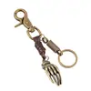 Llavero punk directo de fábrica para hombre, vintage de piel de vaca, aleación de bronce, colgante de palma, colgante para mochila de niña