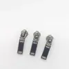 Nº 3 acabamento gun metal brilhante puxador inferior tipo pistola pendurado em estoque peça de puxador de zíper fornecimento direto da fábrica de malas e roupas