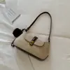 Elegante bolso de hombro de color liso, nueva colección de otoño 2026, simple y moderno, adecuado para el trabajo y los desplazamientos, un bolso de mano único