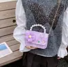 Nueva Versión Coreana Transfronteriza Bolso Infantil de Lazo Pequeño Estilo Chanel Camelia Bolso de Hombro Bolso de Mano con Perlas Versátil Bolso Cruzado