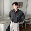 Camisa Sencilla de Moda Primavera 2026 Camisa de Manga Larga Casual Holgada Cuello Solapa Color Sólido Estilo Coreano Top para Hombre