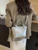 El Bolso Cubo de Moda de Este Año para Mujer 2026 Nuevo Verano Versátil Bolso Pequeño de Hombro Cruzado Bolso de Mano Plateado de Venta Caliente