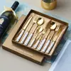 Juego de cubiertos de acero inoxidable para el hogar con mangos de cerámica, cuchillo, tenedor y cuchara, cuchillo y tenedor para bistec estilo occidental, al por mayor para regalos