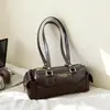 Bolso Femenino de Moda Nuevo Bolso Cilíndrico Versátil de Hombro Único Otoño 2026 Nuevo Bolso de Mano Simple y Elegante para Dama