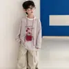 Loja de Algodão Camiseta Infantil Meninos Outono Estilo Coreano 2026 Nova Versátil Solta Listrada Roupa de Outono Top Infantil Tendência