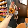 Miu Wind Agua Alcalina Pan Llavero Otoño e Invierno Maillard Lindo Colgante de Pan Pareja Estudiante Decoración de Mochila Escolar