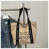 Bolso de lona con estampado de letras grandes estilo coreano, nuevo y moderno 2025, bolso de mano casual texturizado para el día a día