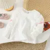 Traje nuevo de estilo coreano para niñas de primavera y otoño 2023 fresco con estampado de flores de dibujos animados, top, camiseta básica, chaleco, conjunto de dos piezas