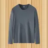 Camiseta de manga larga para hombre de primavera y otoño, sudadera holgada de cuello redondo, camiseta base de color liso, top casual de moda
