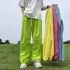 Mono fluorescente verde dopamina retro americano marca de moda para hombre y mujer verano delgado holgado casual recto pierna ancha pantalones
