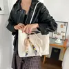 Bolsa de palha trançada retrô para mulheres, novo estilo 2026, bolsa de ombro moderna e versátil, atacado