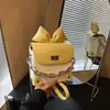 Bolso Pequeño Lindo Mini Lápiz Labial Transfronterizo Bolso de Mujer 2025 Nuevo Lazo Versátil Bandolera Bolso de Hombro de Cadena