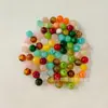 Cuentas Redondas Perforadas de Acrílico Colorido Transfronterizas Europeas y Americanas 12mm Cuentas Sueltas DIY Cadena para Teléfono Collar Pulsera Accesorios de Joyería