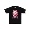 Comercio exterior al por mayor transfronterizo marca de tendencia estilo japonés camuflaje tiburón, cabeza de tigre, hombre-mono bloques de color luminoso manga corta corte holgado camiseta de pareja