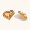 Pendientes de acero inoxidable chapado en oro de 18 quilates con tres capas y borde de puntos en forma de corazón color melocotón para mujer, estilo retro, transfronterizo europeo y americano.