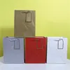 Bolsa de Papel Branco 210g com Estampagem a Quente em Relevo Pronta para Venda Atacado com Cartão de Pendurar Sacola de Compras para Joias Sacola de Presente