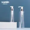 Botella cosmética de plástico transparente de 100 ml para loción, con bomba de presión y cierre plateado brillante de 250 ml, embalaje Xu Min