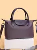 Bolsa tipo dumpling de color block de comercio exterior para mujer, nuevo modelo 2026, bolso de hombro casual versátil, bolso de mano texturizado para ir al trabajo y uso cruzado