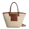 Fornecido diretamente pelo fabricante, bolsa de ombro feminina, bolsa tecida artesanal vintage europeia e americana, bolsa de palha, bolsa de mão casual estilo férias para mulheres