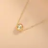 Colgante de collar con diseño de bola de cobre chapado en oro, cadena para la clavícula para mujer, joyería simple y versátil de aleación de cobre al por mayor del fabricante