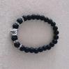 Venta caliente transfronteriza nueva 8 mm piedra negra esmerilada cabeza de leopardo dorada antigua plata cabeza de león pulsera elástica para hombres y mujeres venta al por mayor
