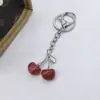 Llavero de Cereza de Moda Retro Europeo y Americano Más Vendido Transfronterizo con un Toque de Alta Gama, Accesorio Colgante de Fruta de Cereza para Bolsa