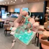 Desenho animado de areia movediça urso dos sonhos menina chaveiro cor de leite em pó boneca fofa pingente de bolsa casal presente pequeno atacado