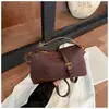 Bolso tipo almohada de retazos esmerilados retro de comercio exterior 2026 Nuevo de gran capacidad moderno de un solo hombro cruzado Bolso de mano versátil