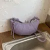 Bolsa versátil de moda casual transfronteiriça, grande capacidade, novo modelo da primavera de 2026, bolsa bolinho, bolsa de ombro e transversal