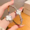 Conjunto de Pulseira e Anel de Concha Flor da Sorte de Alta Qualidade Pulseira de Cobre Galvanizado